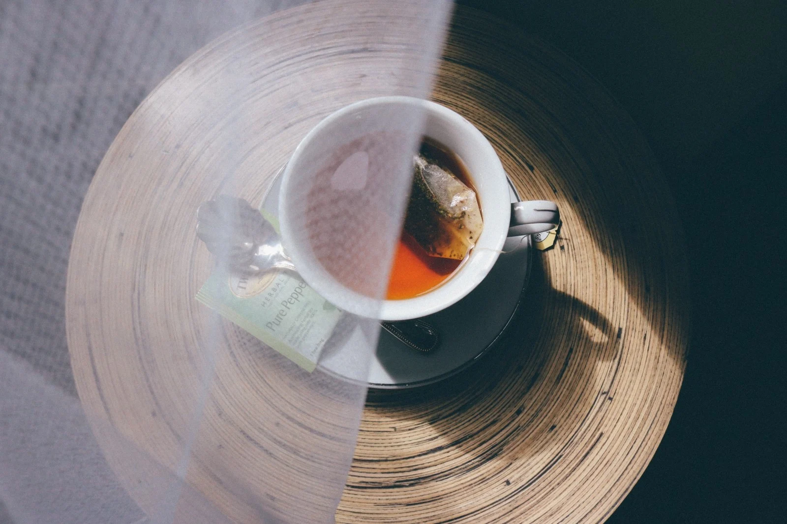 A cup of tea hidden behind tulle