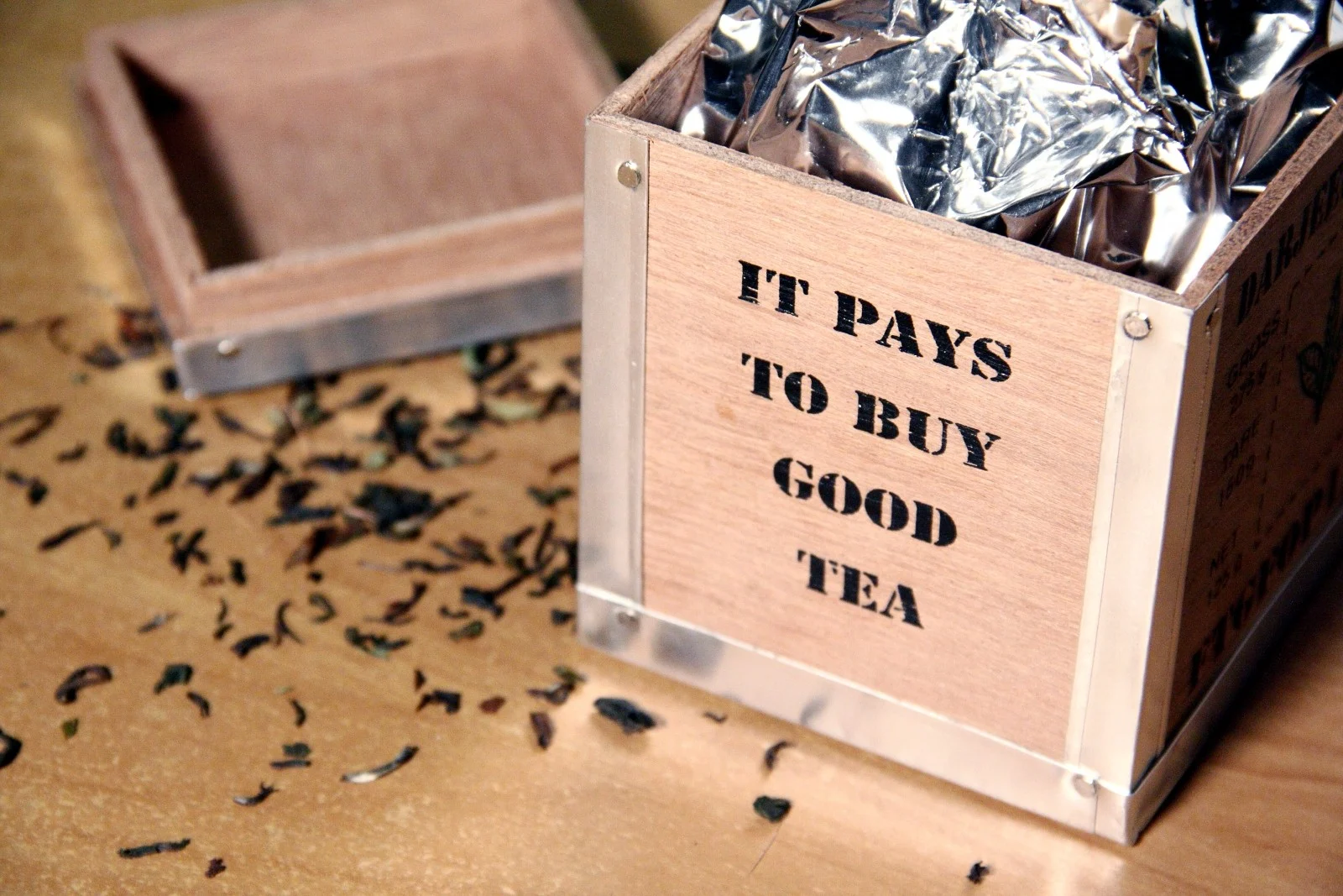 a tea box reading 'It pays to buy good tea'